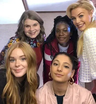 Precious Mustapha with her Fate The Winx Saga co stars