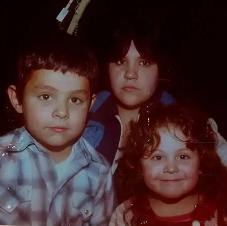 Jesse Garcia with his mother and sister