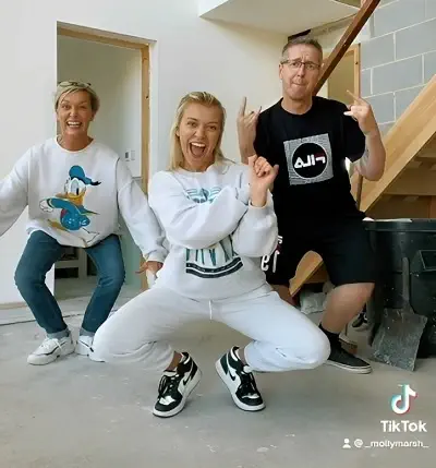 Molly Marsh with her mother and father